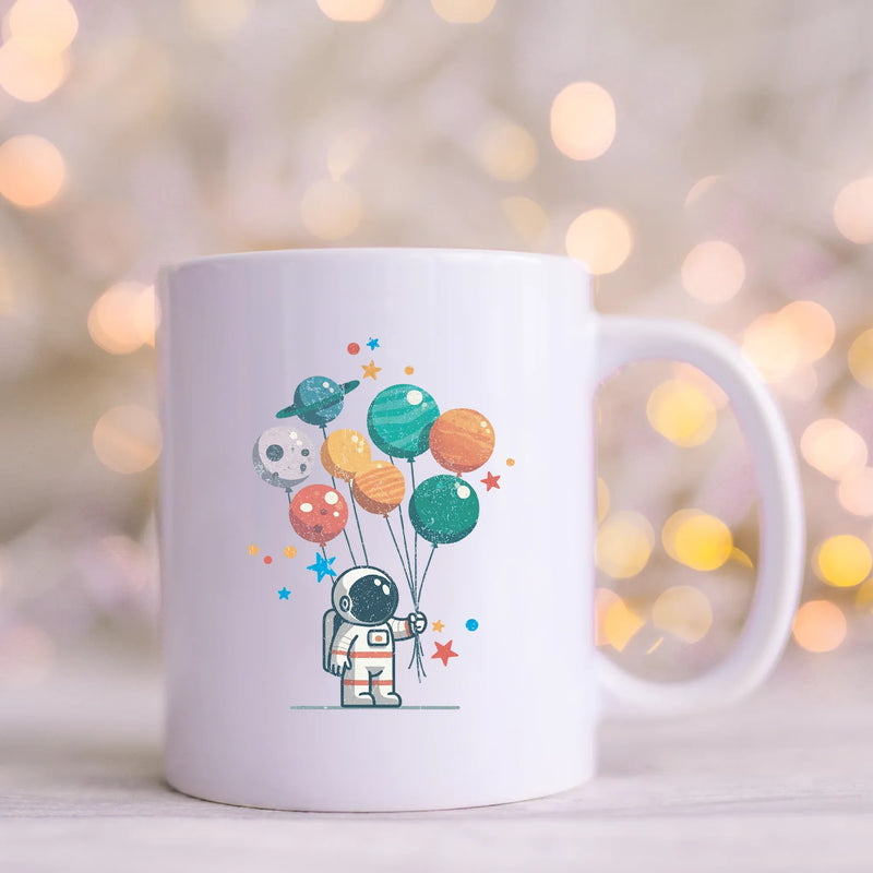 Astronaut Holding Planet Balloons Ceramic Mug 11 oz White - Panvola