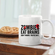 Zombies Eat Brains Don’t Worry You’re Safe Ceramic Mug 11 oz White - Panvola