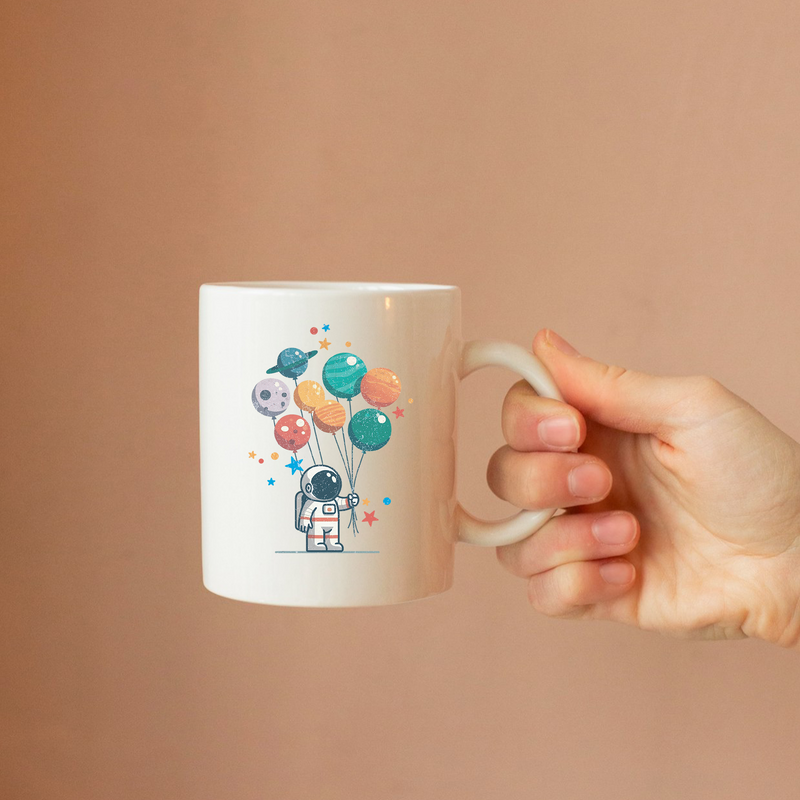 Astronaut Holding Planet Balloons Ceramic Mug 11 oz White