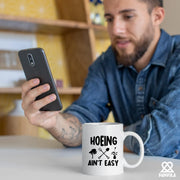 Hoeing Ain't Easy Ceramic Mug 11 oz White - Panvola
