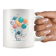 Astronaut Holding Planet Balloons Ceramic Mug 11 oz White - Panvola