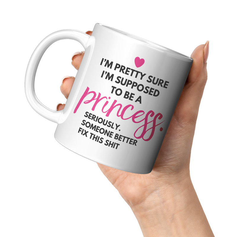 Funny_Princess_Gift_-_Im_Supposed_To_Be_11oz_White_LH_Model_Mockup.png