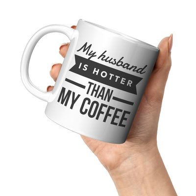 My_Husband_Is_Hotter_Than_My_Coffee_Mug-_11oz_White_LH_Model_Mockup.png