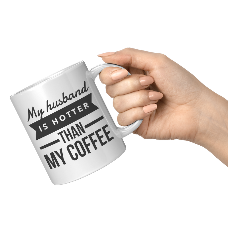 My_Husband_Is_Hotter_Than_My_Coffee_Mug-_11oz_White_RH_Model_Mockup.png