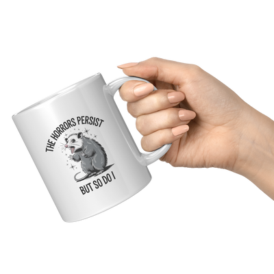 The_Horrors_Persist_So_Do_I_Ceramic_Mug__11oz_White_RH_Model_Mockup.png