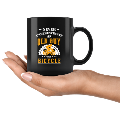 Never Underestimate An Old Guy On A Bicycle Ceramic Black Mug 11 oz