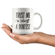 Funny Future Dentist Gift Trust Me I'm Almost a Dentist Ceramic Coffee Mug.
